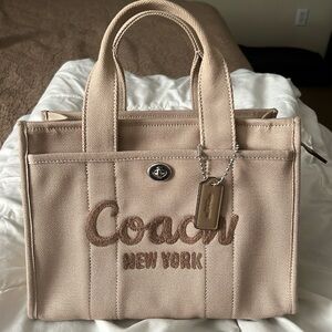 Coach cargo tote 26